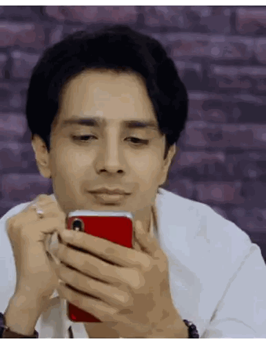 Man In White Shirt Looking At Cell Phone Sticker