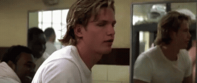 Man In White Shirt Looking In Bathroom Mirror GIF