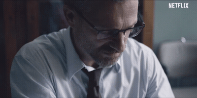 Man In White Shirt Looking In Mirror GIF