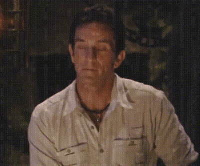Man In White Shirt Making Funny Face Eyes Closed GIF