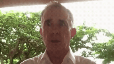 Man In White Shirt Making Funny Face GIF