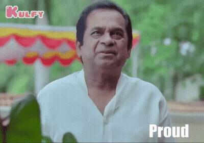 Man In White Shirt Making Funny Face Proud GIF
