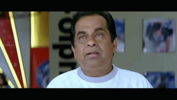 Man In White Shirt Making Funny Face GIF