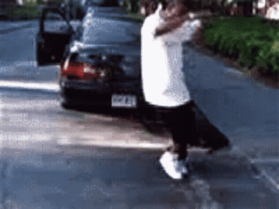 Man In White Shirt Next To Car With License Plate Aa GIF