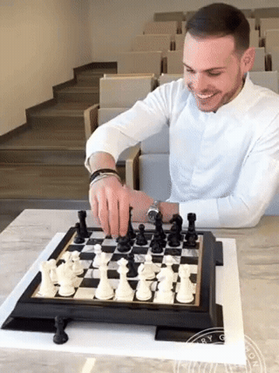 Man In White Shirt Playing Chess GIF