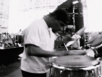 Man In White Shirt Playing Drums GIF