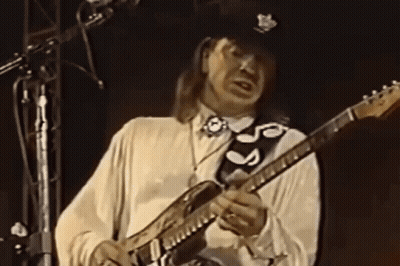 Man In White Shirt Playing Guitar With Black Strap S GIF