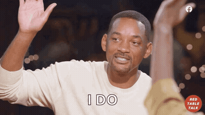 Man In White Shirt Raising Hand And Saying I Do GIF