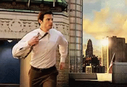 Man In White Shirt Running GIF