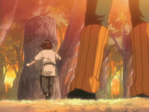 Man In White Shirt Running Through Woods GIF