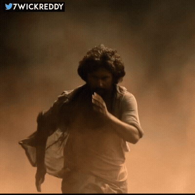 Man In White Shirt Running With Twitter Icon Saying 7Wickreddy GIF