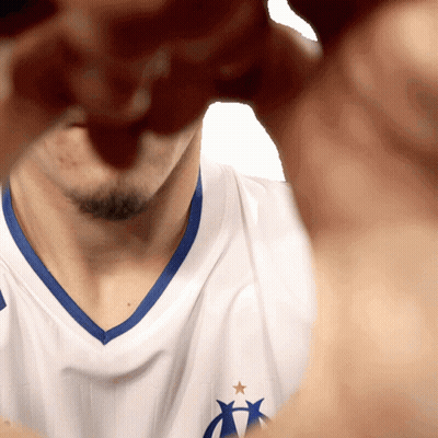 Man In White Shirt Saying Azo Making Fist GIF