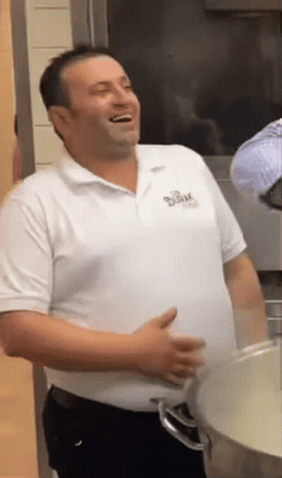 Man In White Shirt Saying Bak GIF