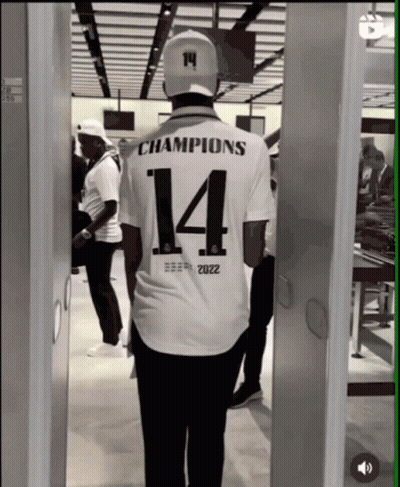Man in White Shirt Saying Champions 14