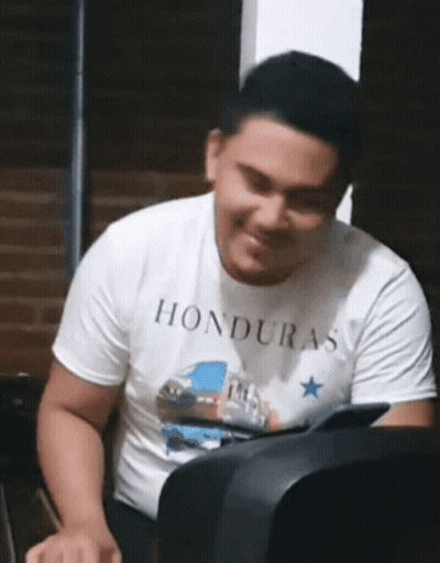 Man In White Shirt Saying Honduras Smiling GIF