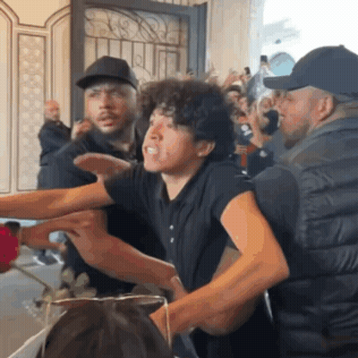 Man In White Shirt Saying Live Sage GIF