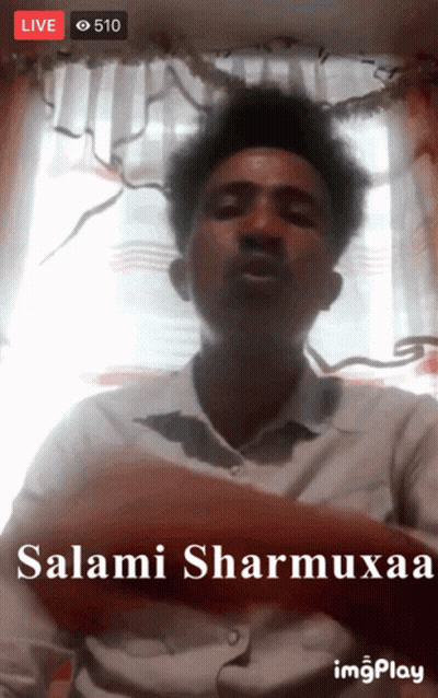 Man In White Shirt Saying Salami Sharmuxaa GIF