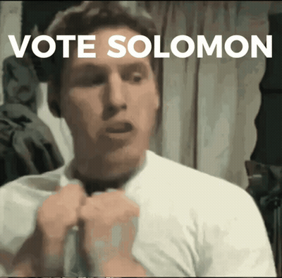 Man In White Shirt Saying Vote Solomon GIF