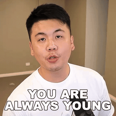 Man In White Shirt Saying You Are Always Young GIF