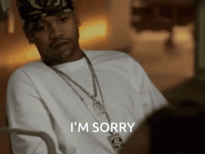 Man In White Shirt Says I'm Sorry With Necklace GIF