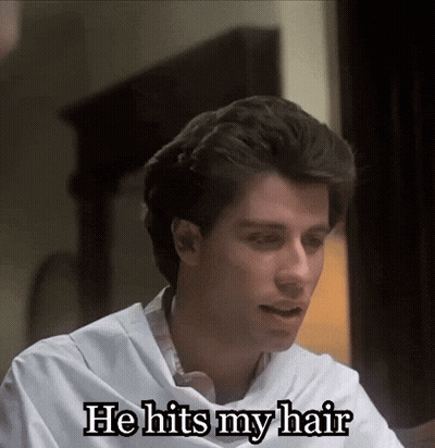 Man in White Shirt Sitting at Table Says He Hits My Hair