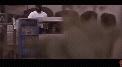Man In White Shirt Sitting In Car In Dark Room GIF