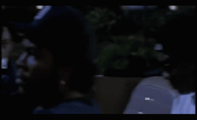 Man In White Shirt Sitting In Car With Sign Saying Adam GIF