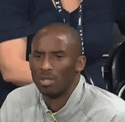 Man In White Shirt Sitting In Stadium With Woman GIF