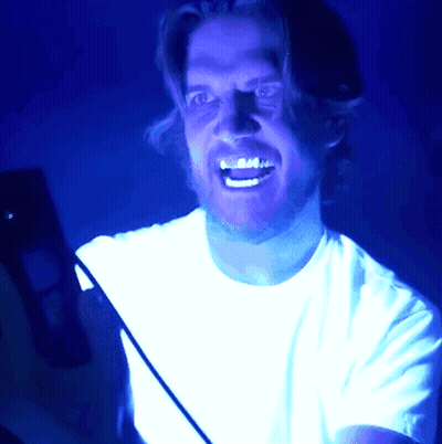 Man In White Shirt Smiling Blue Background GIF