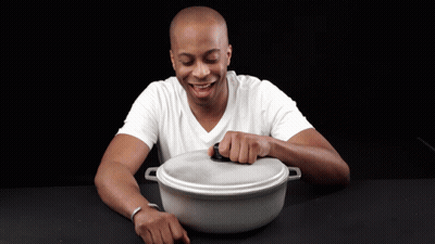 Man In White Shirt Smiling Opening Pot GIF