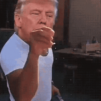 Man In White Shirt Smoking And Pointing GIF