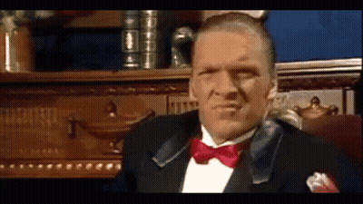 Man In White Shirt Smoking And Pointing GIF