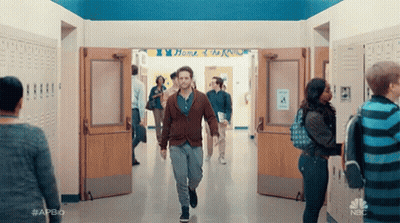 Man In White Shirt Standing By Door GIF