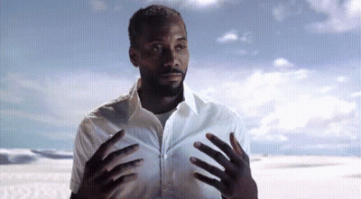 Man In White Shirt Standing In Desert GIF