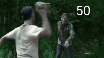 Man In White Shirt Standing In Forest With Number 50 GIF
