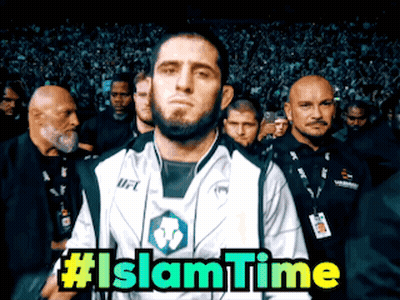 Man In White Shirt Standing In Front Of Crowd #Islamtime GIF