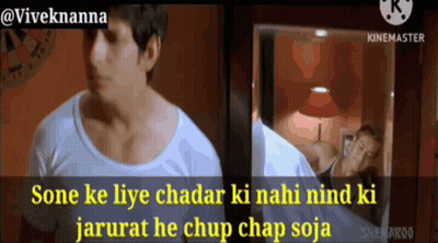Man In White Shirt Standing In Front Of Mirror GIF