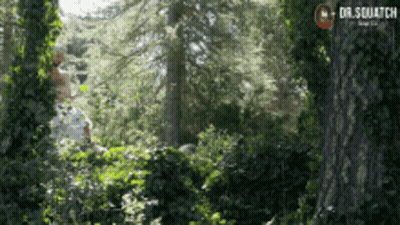 Man In White Shirt Standing In Woods Dr.Squatch GIF
