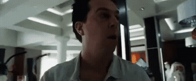 Man In White Shirt Standing GIF