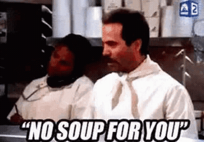 Man In White Shirt Talking On Cell Phone In Kitchen GIF