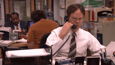 Man In White Shirt Talking On Phone GIF