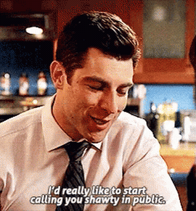 Man In White Shirt Talking To Man In Kitchen GIF