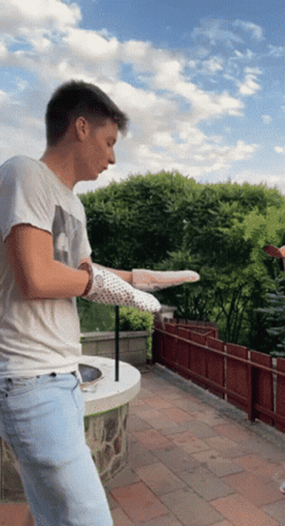 Man In White Shirt Tossing Pizza GIF