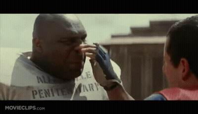 Man In White Shirt Touching Another Man's Nose Penitentiary GIF