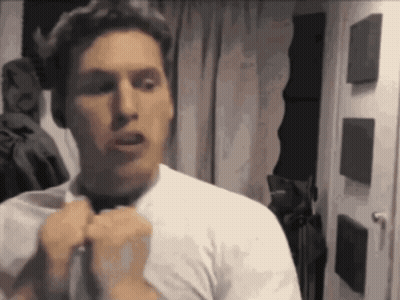 Man In White Shirt Tying Black Tie GIF