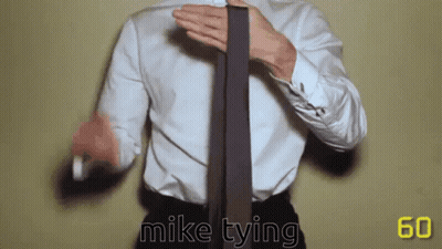Man In White Shirt Tying Tie Saying Mike Tying GIF