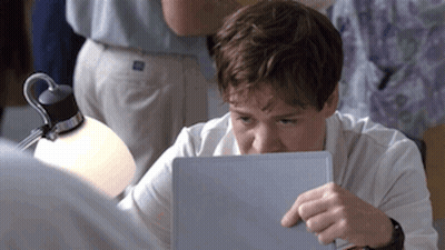 Man In White Shirt Using Laptop GIF