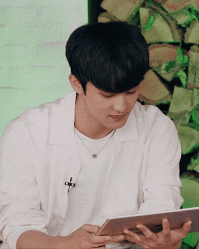 Man In White Shirt Using Tablet GIF