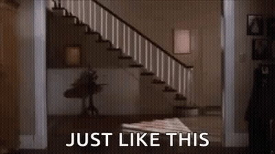 Man In White Shirt Walking Down Stairs GIF