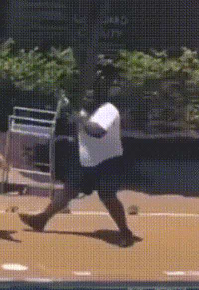 Man In White Shirt Walking On Tennis Court GIF